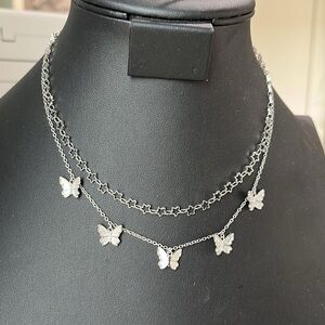 2, 17 inch silver tone Pura Vida necklaces, stars and butterflies